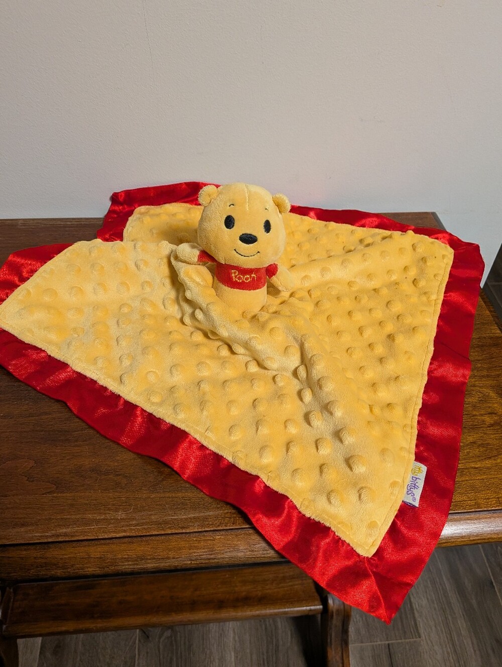 Hallmark Itty Bitty Winnie the Pooh Yellow Plush Lovey with Red Satin Trim.